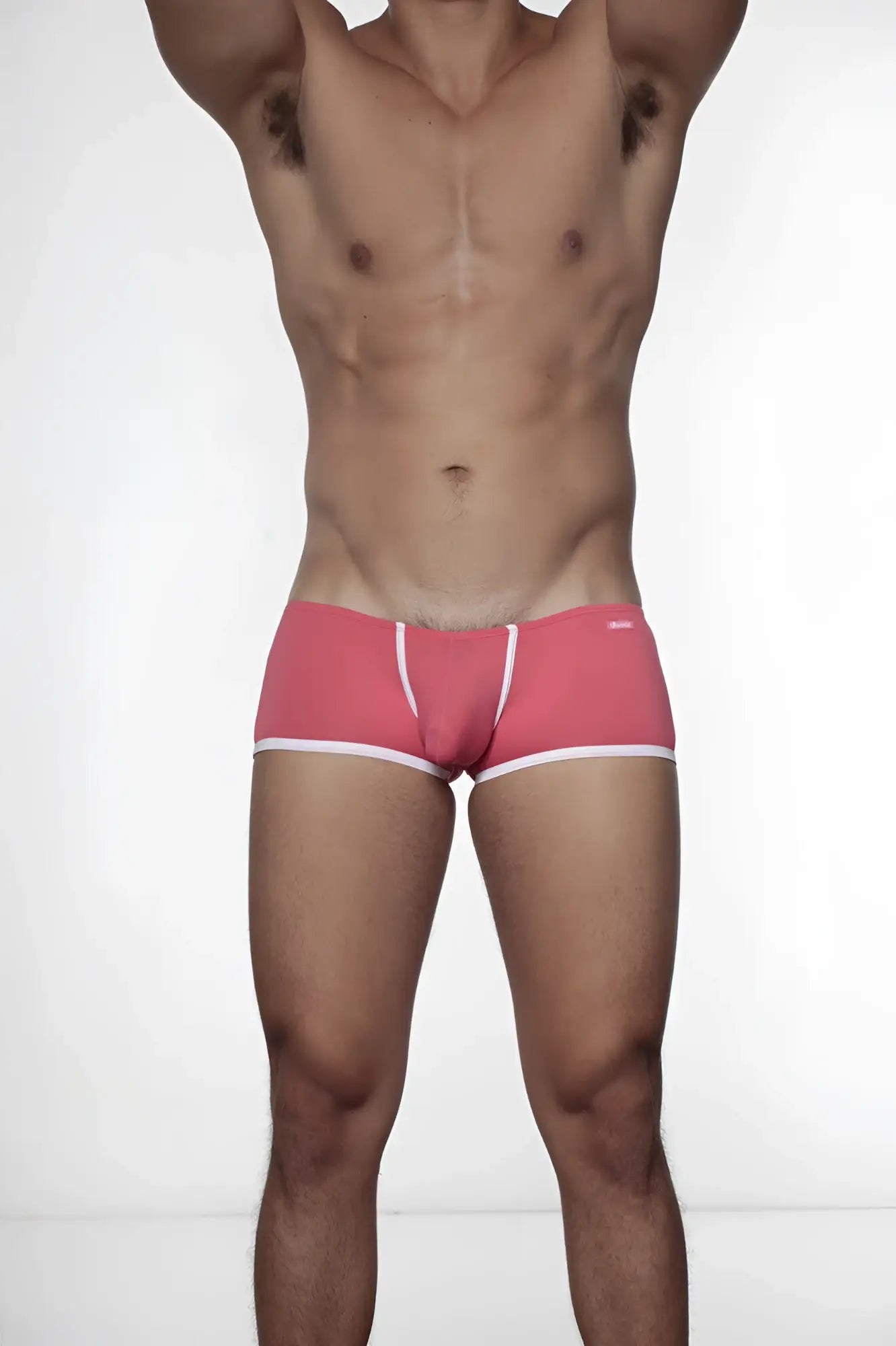 Pink groovin underwear super extra low cut boxer briefs with white trim and logo on the waistband in rouge red