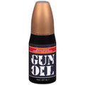 Black bottle of gun oil silicone lubricant 8oz with copper cap and white branding in flip top bottle