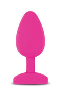 A vibrant pink silicone butt plug with smooth surface rounded head and flat base gvibe gplug large bioskin raspberry