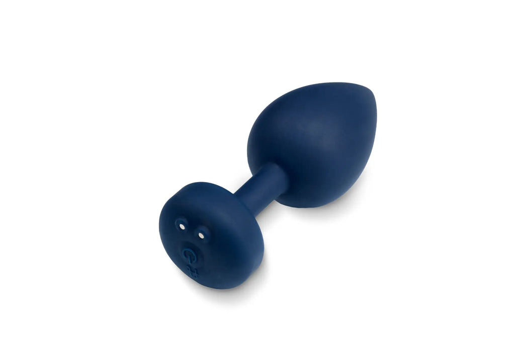 Navy blue silicone anal plug with rounded head and white dot eyes by Gvibe Gplug Large Ocean Blue