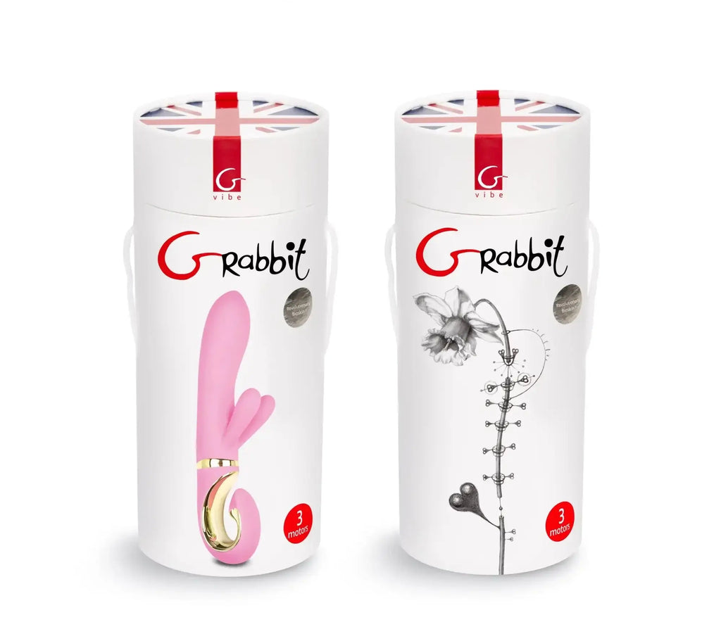 Pink silicone rabbit-shaped vibrator in white cylindrical box with red and black branding gvibe grabbit candy pink