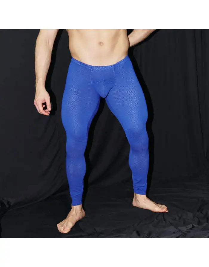 Men's blue mesh runner tights by Arroyman featuring a snug fit and breathable fabric shown on a model.