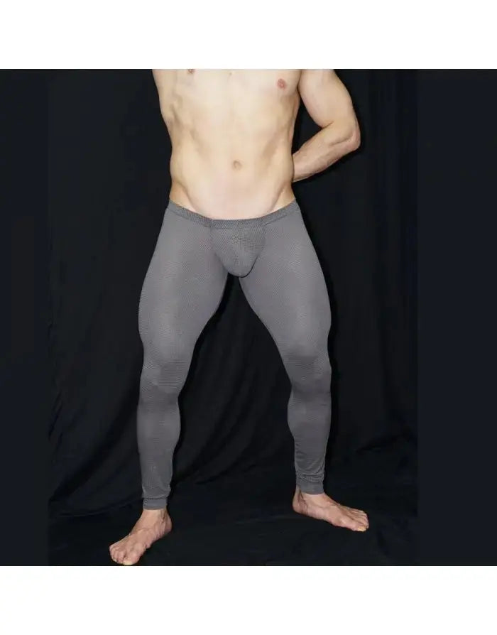 Men's grey mesh gym tights by Arroyman featuring a snug fit and bulge design shown on a model against a dark background.