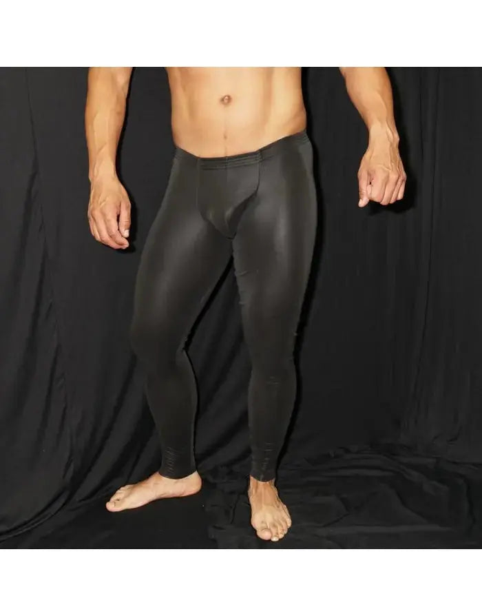 Black eco leather runner tights by Arroyman featuring a fitted design and smooth texture shown on a male model.