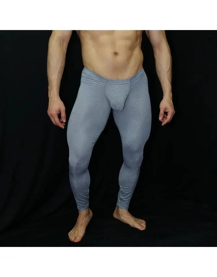Light blue men's gym tights by Arroyman featuring a snug fit and textured pattern shown on a model.