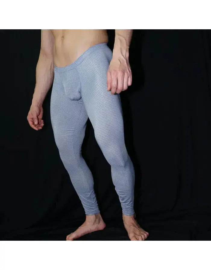Light blue gym tights by Arroyman featuring a fitted design and textured pattern shown on a male model.
