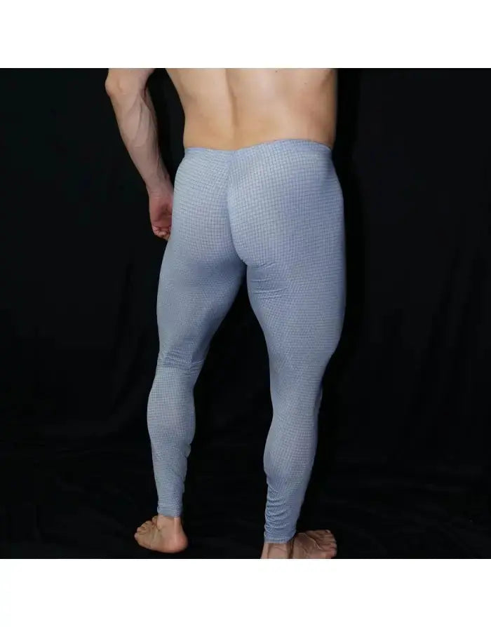 Light blue men's gym tights by Arroyman featuring a fitted design and textured pattern shown from the back.