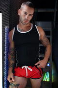 Gymnetixxx tank black and white breathable tank top paired with red shorts featuring a white drawstring for gym use