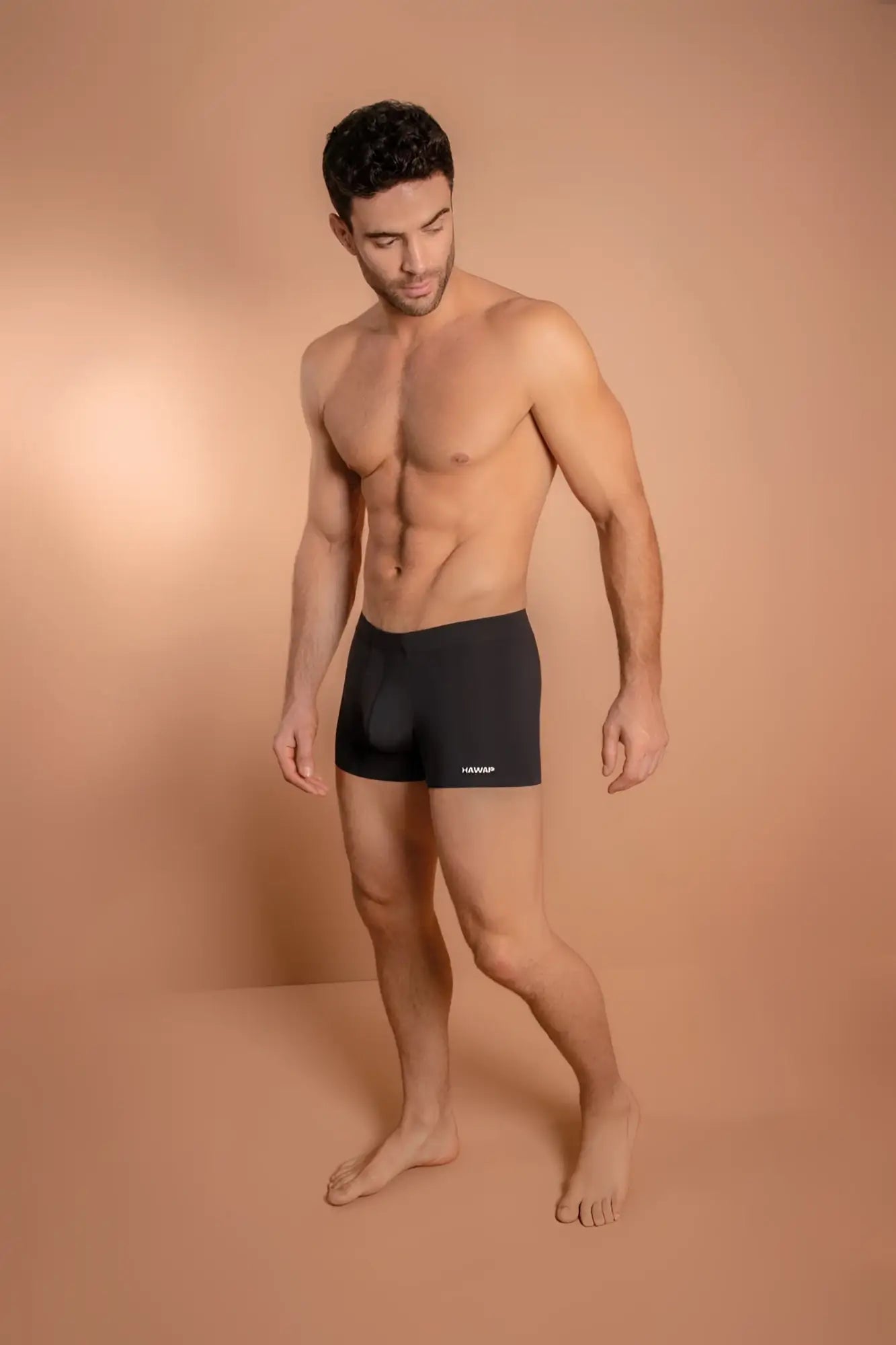 Black microfiber men’s briefs hawai 42222 with a subtle logo on the lower left leg in black color