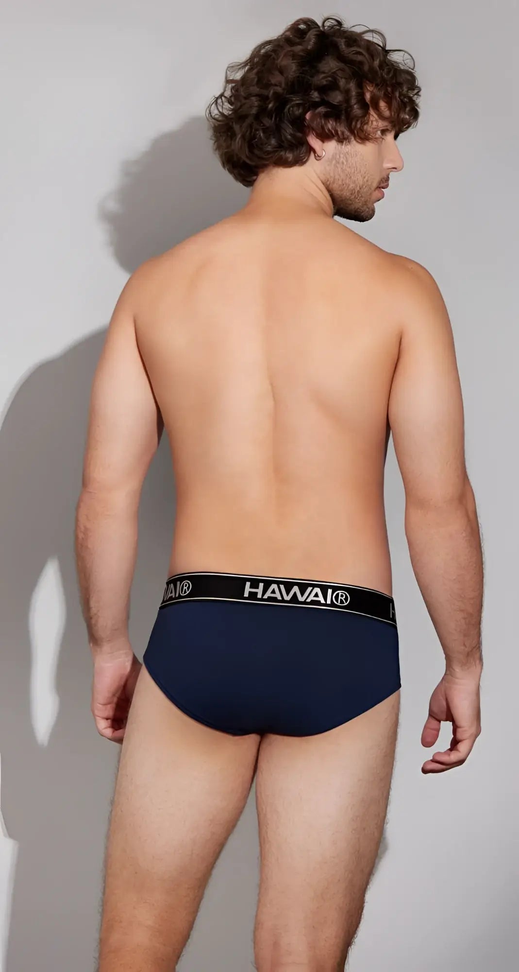 Navy blue havai cotton blend briefs with black elastic waistband featuring white brand name lettering