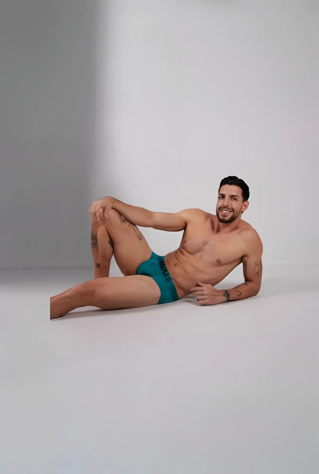 Teal green hawaair 41963 microfiber men’s briefs with a black logo waistband front view