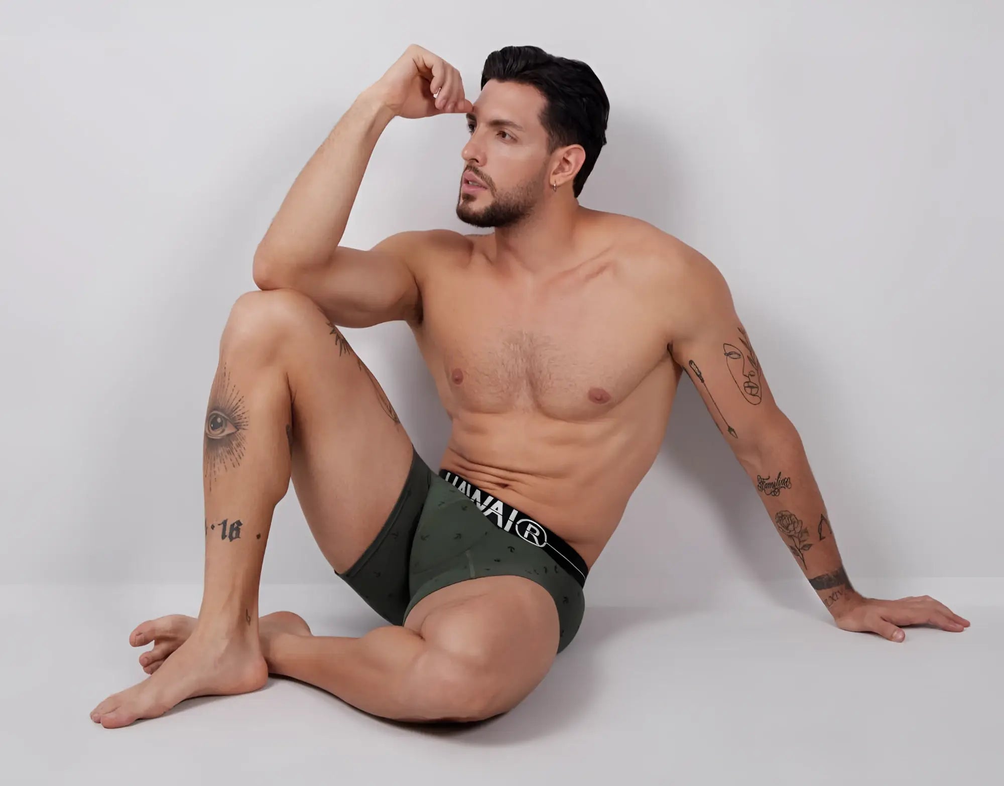 Olive green mens cotton blend boxer briefs with black waistband and white hanai branding hawair 42521 trunks