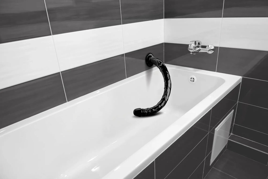 Black curved silicone bath accessory hose 19in with textured surface and glossy finish for realistic use