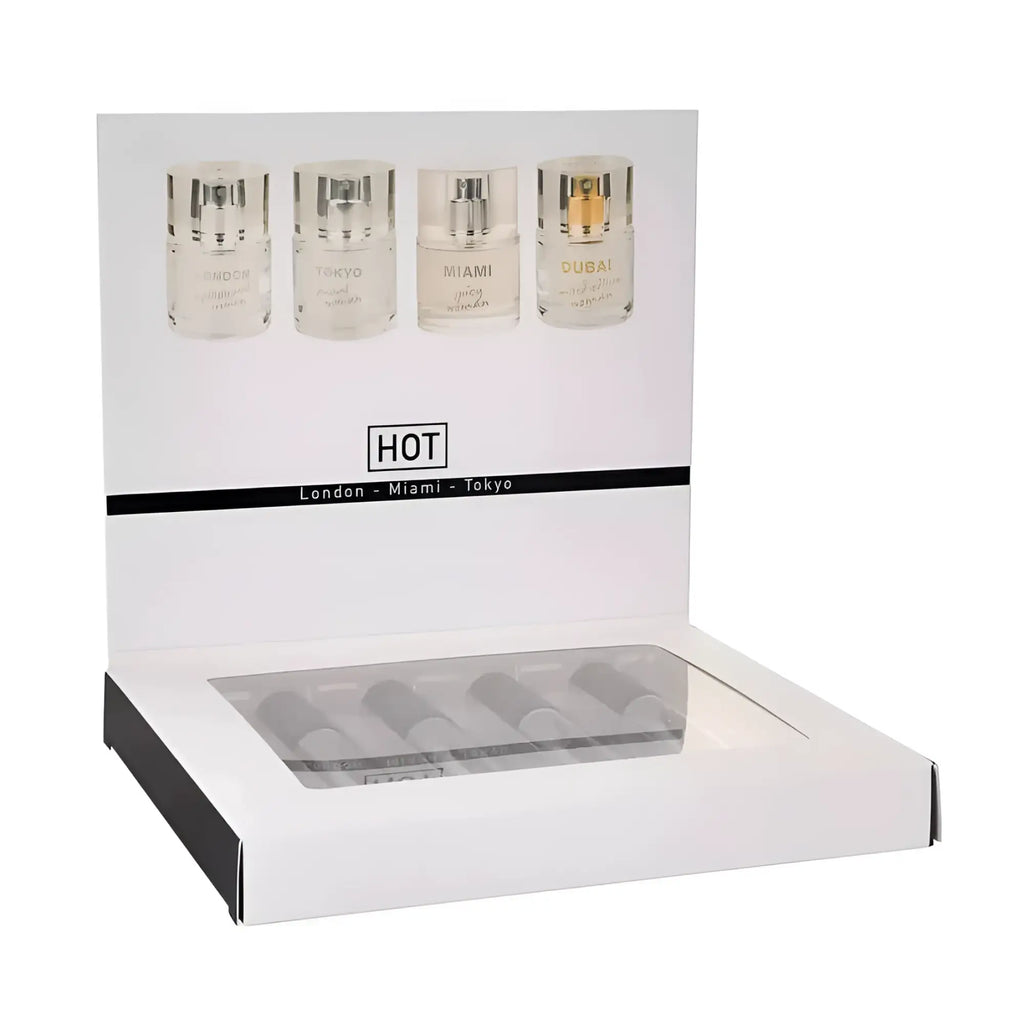 White cardboard display box with clear window showing four 5ml hot pheromone perfume bottles labeled london miami tokyo dubai