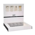 White cardboard display box with clear window showing four 5ml hot pheromone perfume bottles labeled london miami tokyo dubai