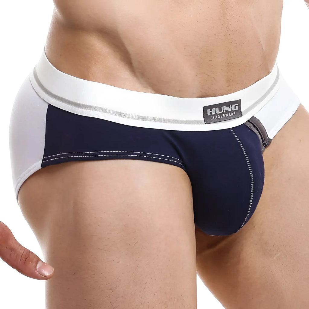 Navy blue and white menâ€™s briefs with a black hung underwear label on the waistband hung hgj010 brief