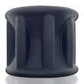 Dark gray ribbed silicone ring with smooth rounded exterior and vertical grooves from hunkyjunk gyroball ballstretcher tar ice