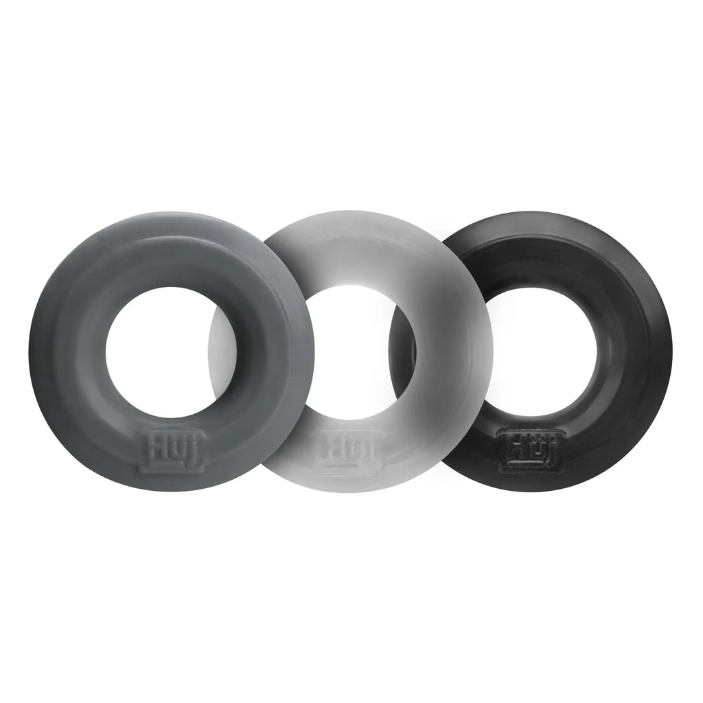 Three silicone rings in dark gray light gray and black with subtle embossed logo by hunkyjunk huj3 c-ring 3 pk