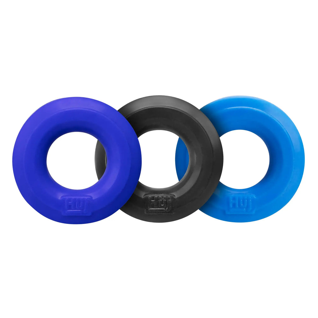 Three silicone rings by hunkyjunk in vibrant blue matte black and light blue with embossed logo on outer edge