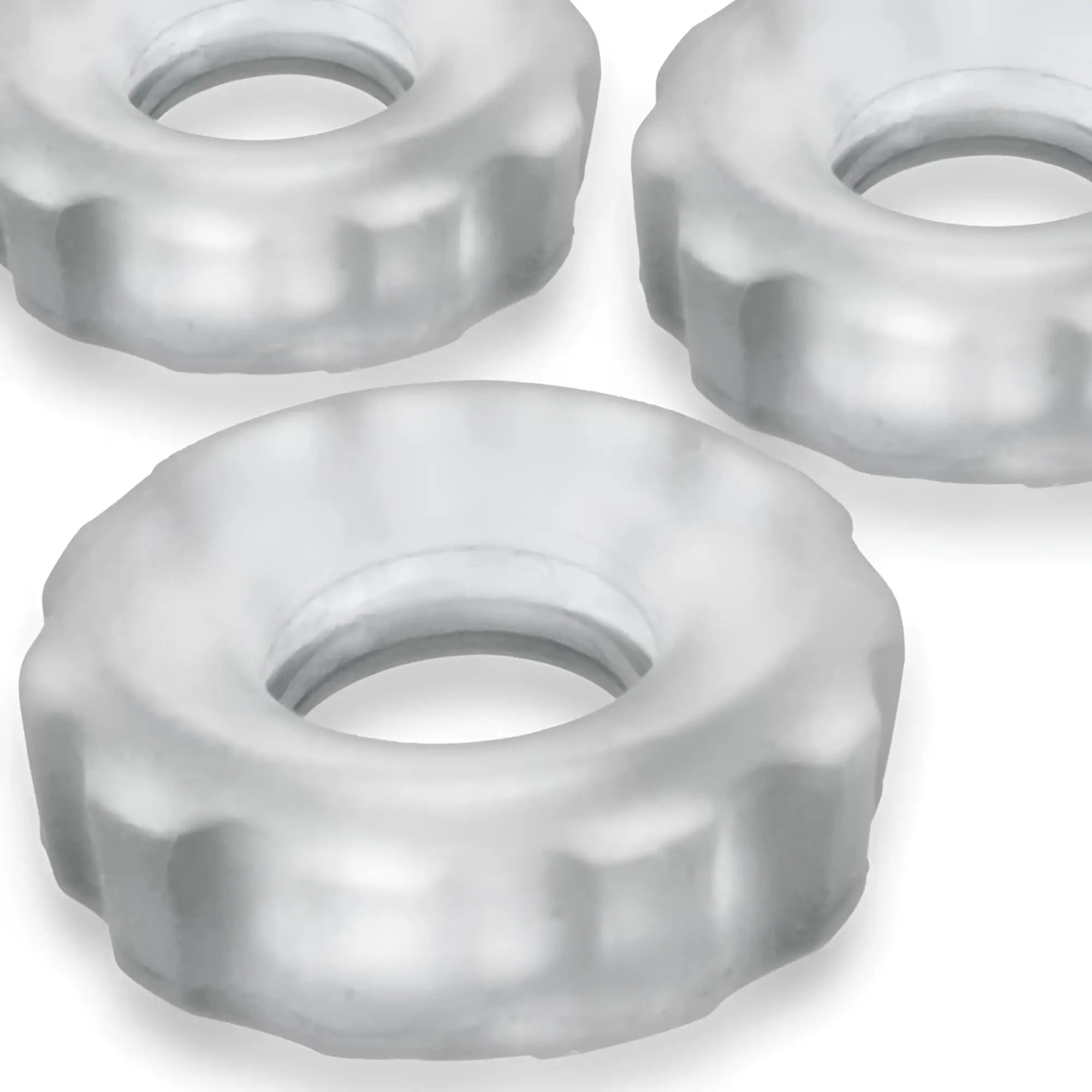 Clear translucent silicone ring covers with scalloped edges from hunkyjunk super hunkyjunk 3 pc cockrings clear ice set