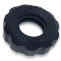 Black textured rubber cockring with scalloped edge and embossed hui branding from hunkyjunk super hunkyjunk set