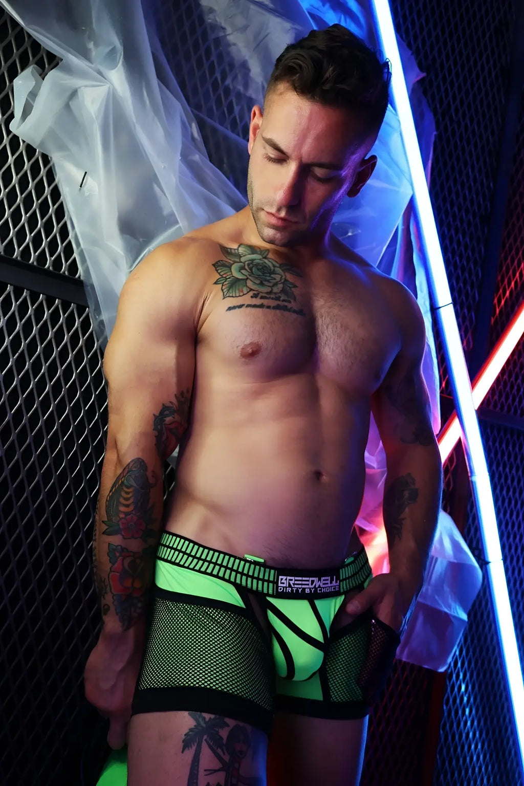 Neon green mesh briefs with black trim and brenden dirty & chiseled waistband logo from hybred chock collection
