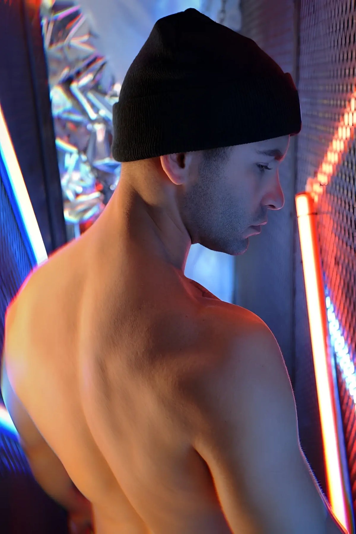 Black knit beanie by iconixxx featuring a soft ribbed texture perfect for cold weather use