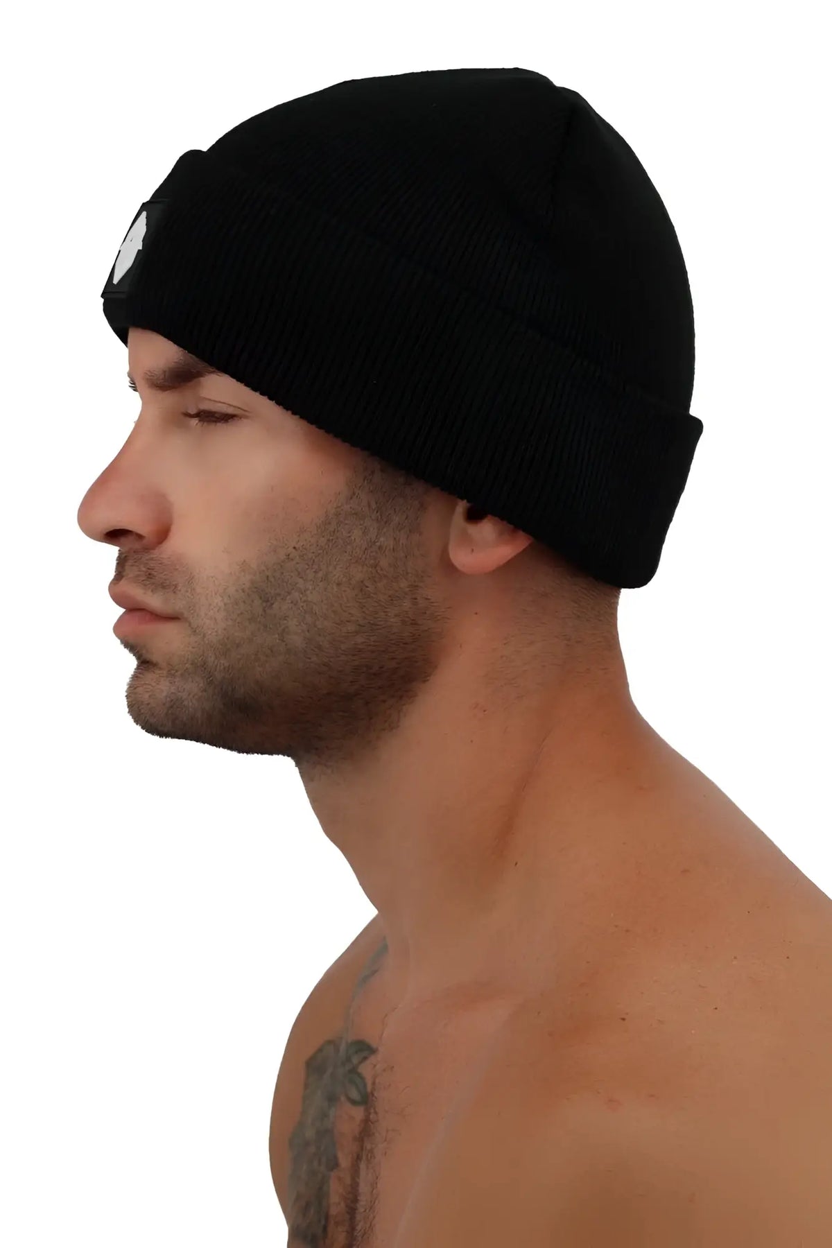 Black knit beanie by Iconixxx with a small white circular logo on the front for casual cold weather wear