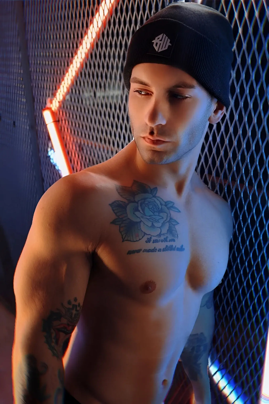 Black Iconixxx beanie made of knit material with a white embroidered logo on the front perfect for cold weather
