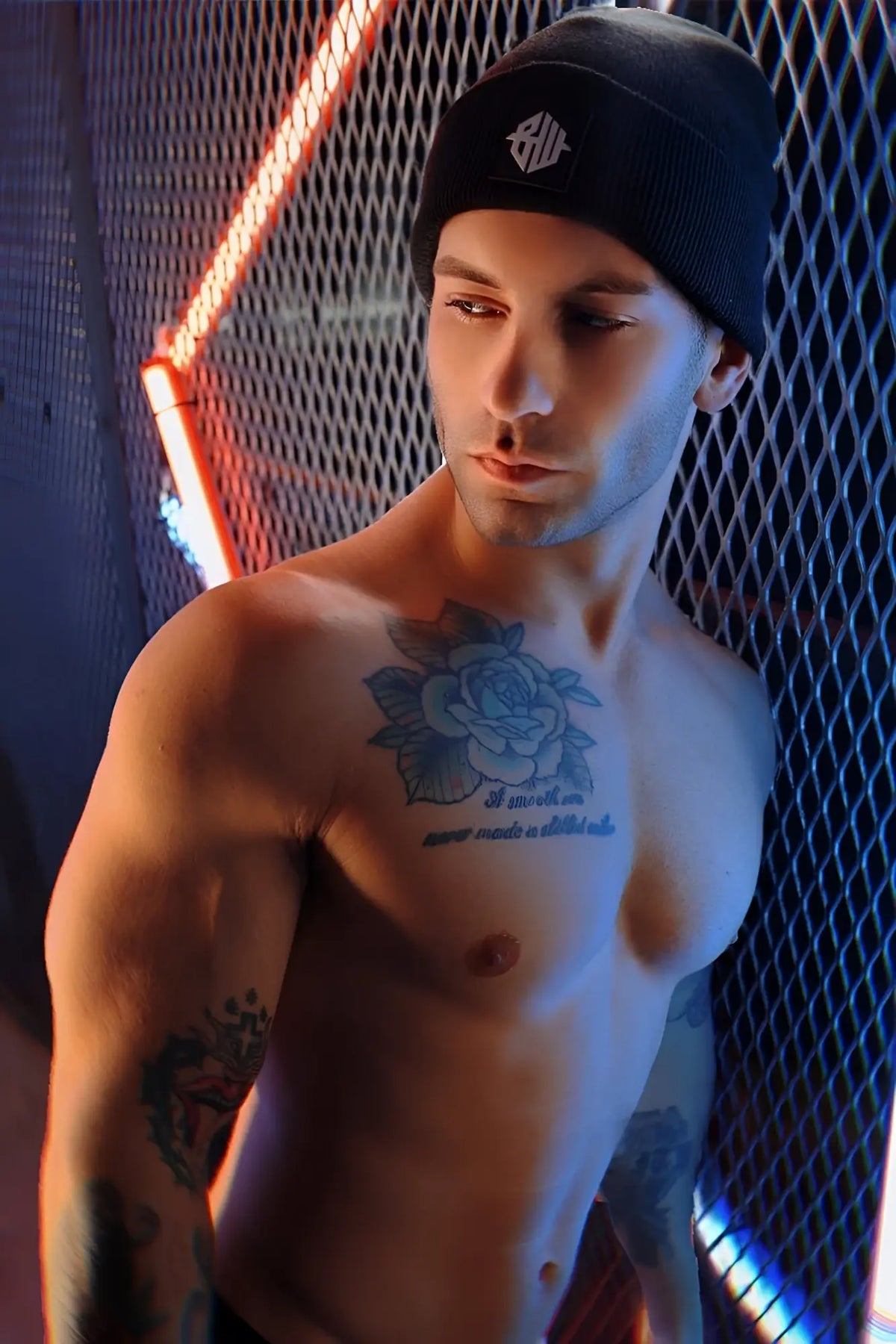 Black Iconixxx beanie made of knit material with a white embroidered logo on the front perfect for cold weather