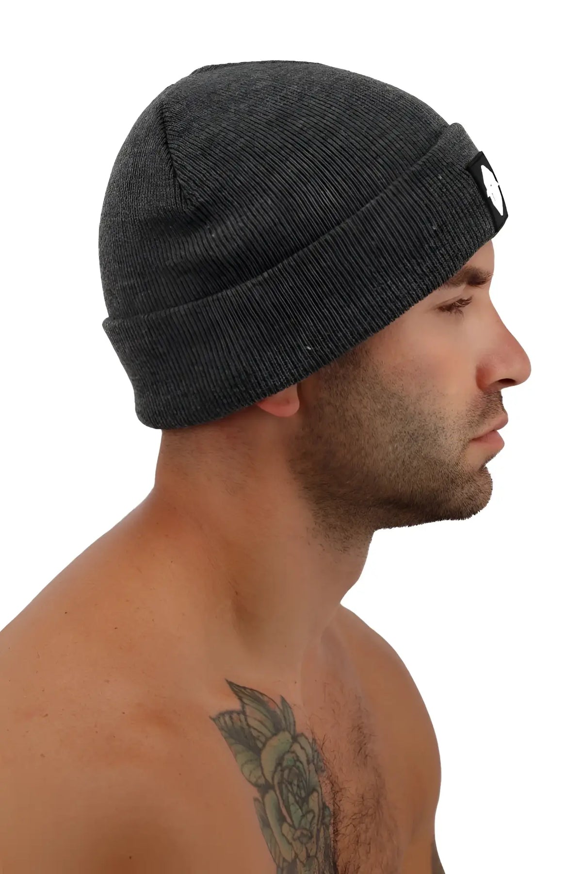 Dark gray knit beanie with folded cuff and small black logo patch on the side by iconixxx beanie