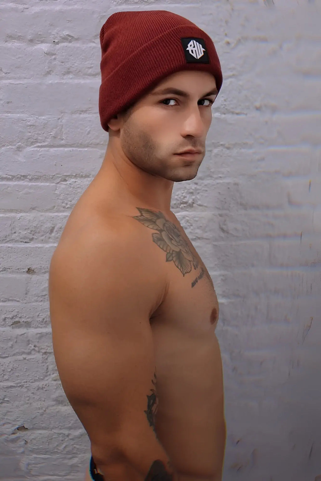 Iconixxx beanie maroon knitted beanie with black embroidered logo patch on front for casual wear