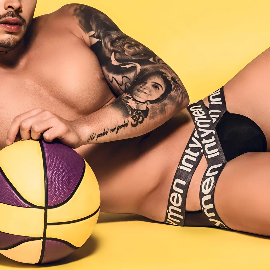 Intymen ine017 jockstrap with yellow and purple basketball design and black lines for athletic support