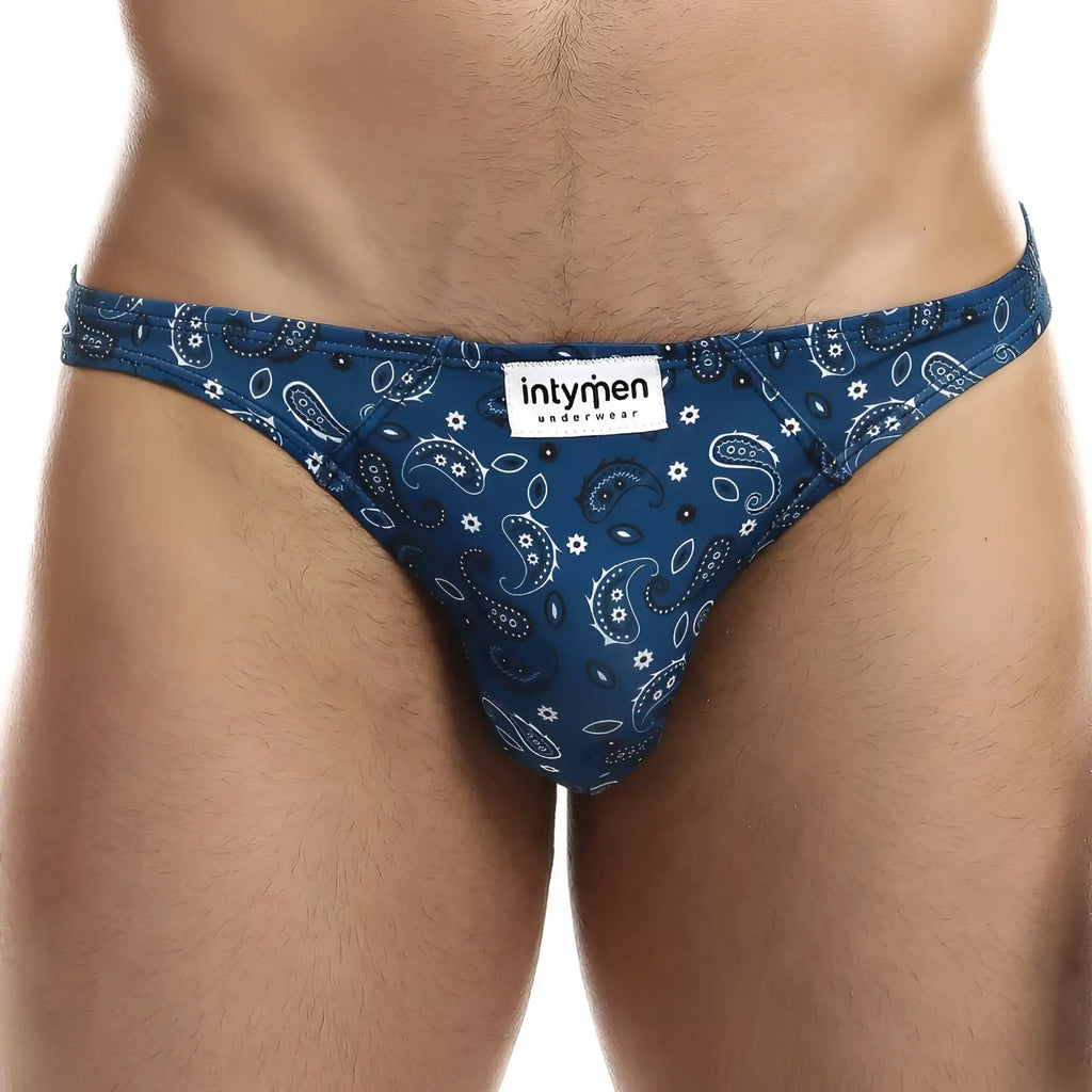 Blue paisley-patterned intymen ini027 bikini brief for men with white and black accents and branded intyren label