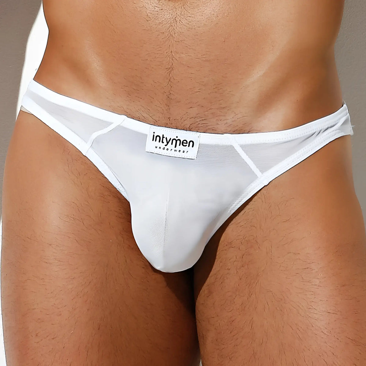 White mesh thong bikini brief with branded label from intymen underwearwear in ini031 style front view