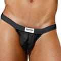 Black mesh thong bikini brief with white polka dots and Intymen branded label in front view