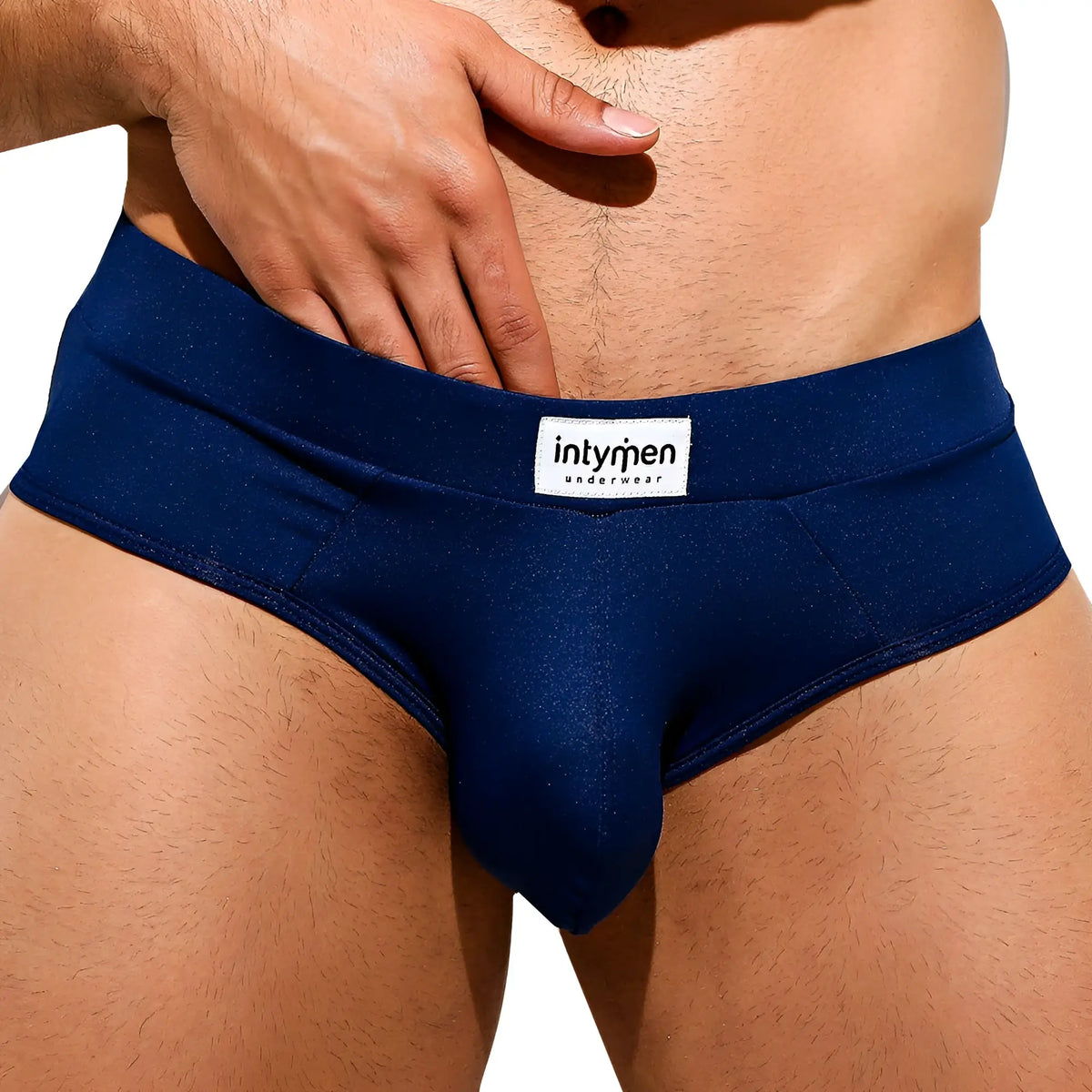 Navy blue Intymen INJ062 brief underwear with subtle sheen and white brand label on the waistband