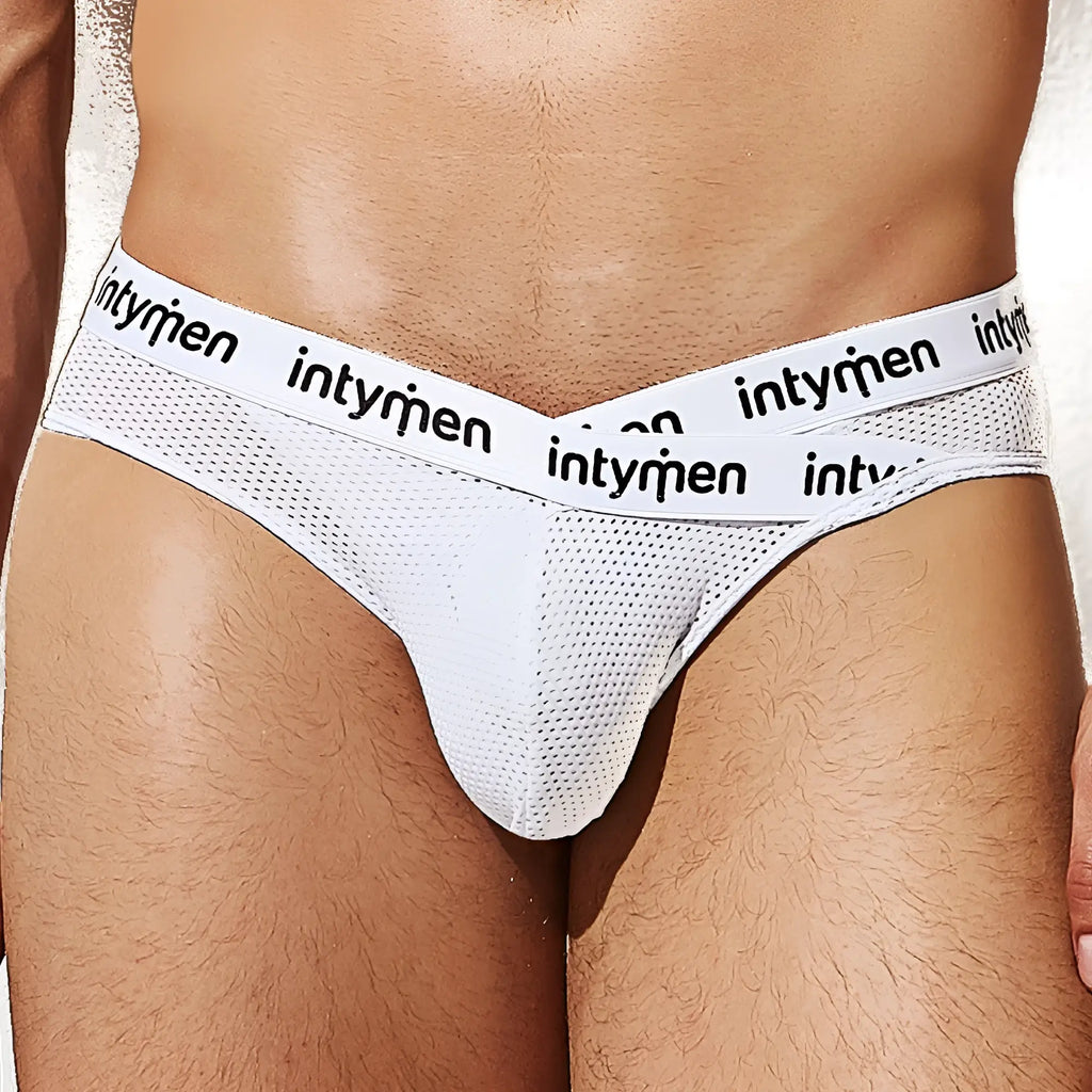 White mesh briefs with a black intymen logo waistband in the Intymen INJ081 brief design