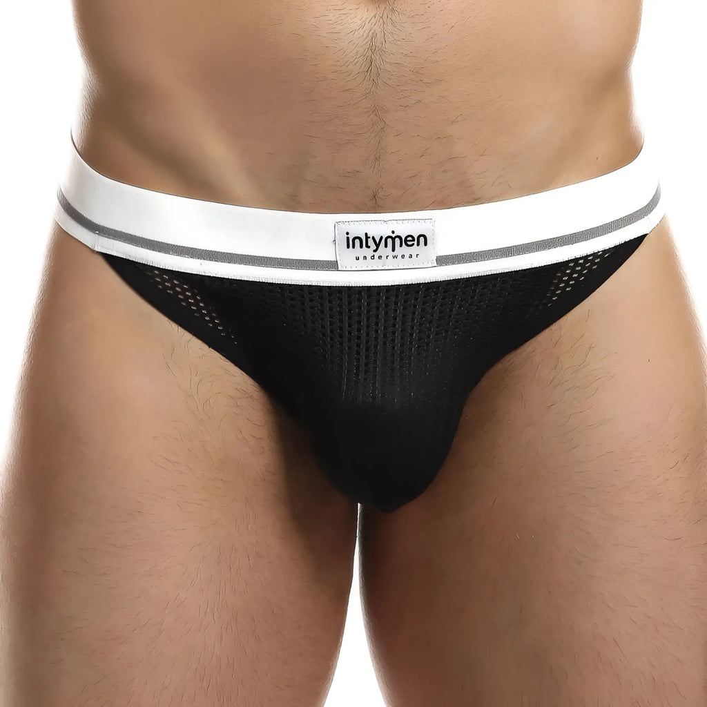Black mesh briefs with a white waistband gray stripes and intymen underwear label front view from intymen ink010 jockstrap
