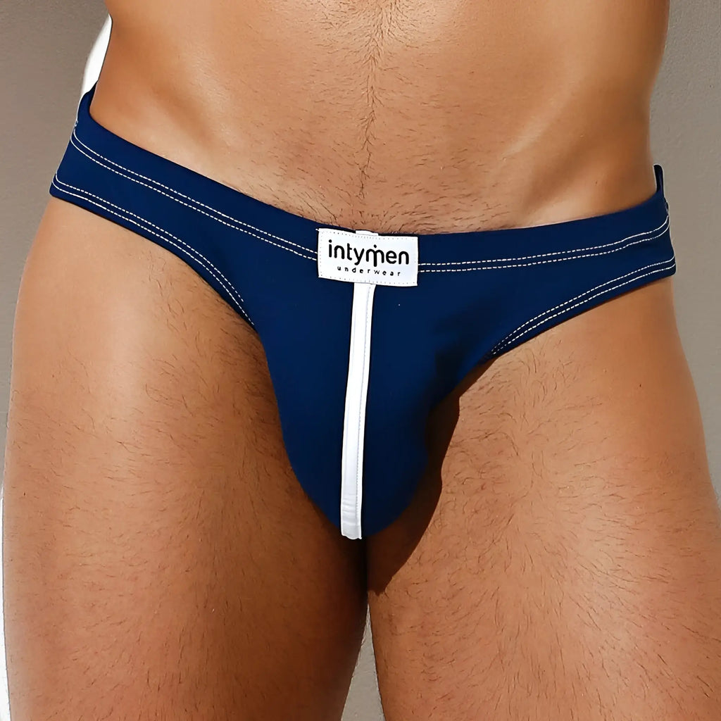 Navy blue intymen ink011 thong with white stitching and central stripe designed for comfortable daily wear
