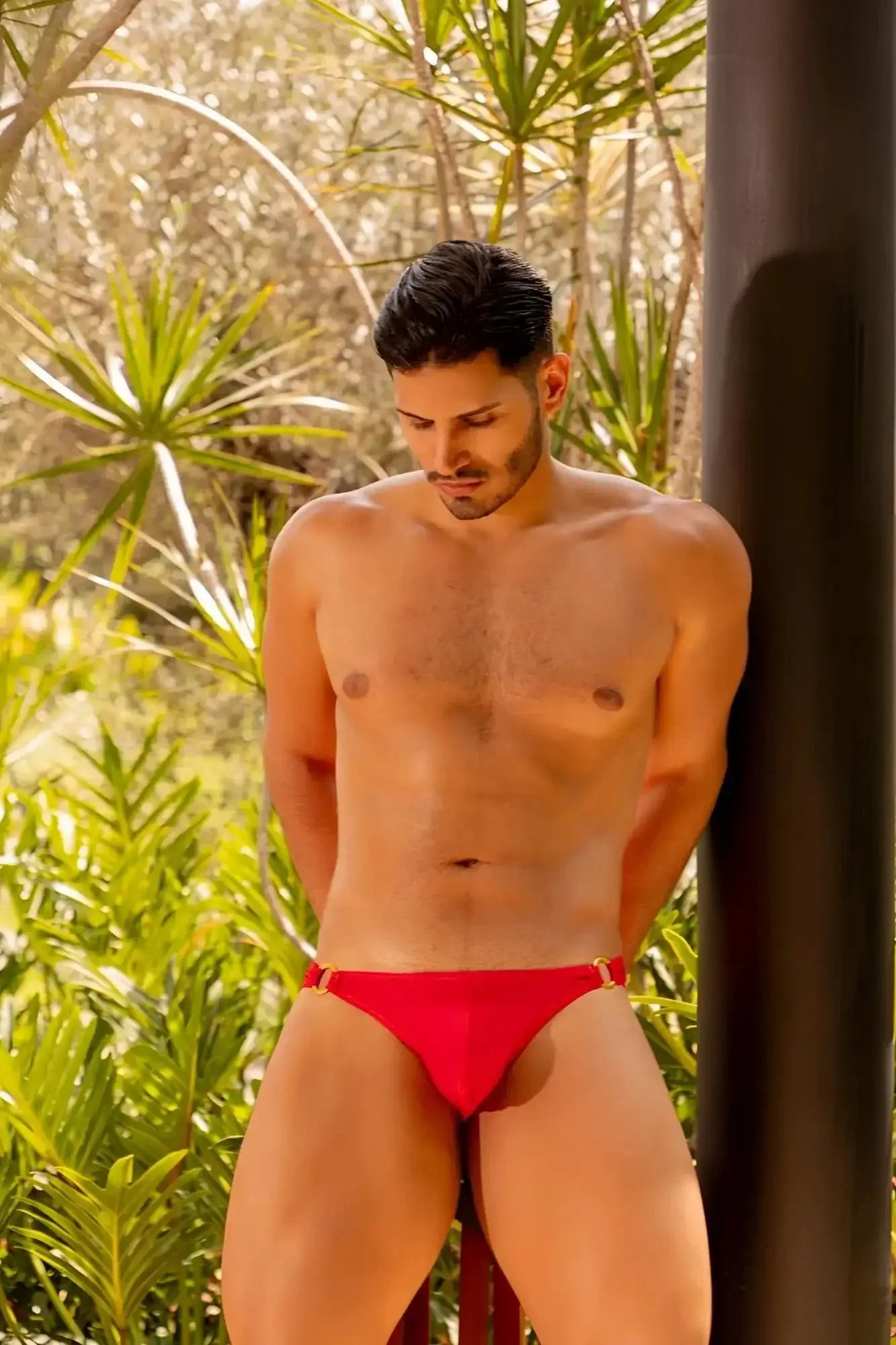 Red jor 2152 magnus bikini briefs featuring gold-tone hardware in a vibrant red color