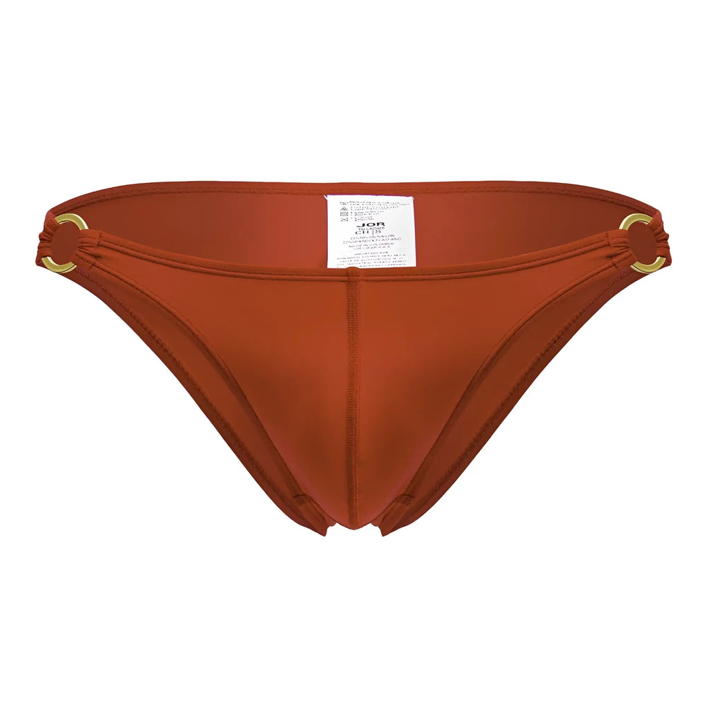 A sleek rust-orange jor 2152 magnus bikini bottom with gold toned circular hardware at the sides