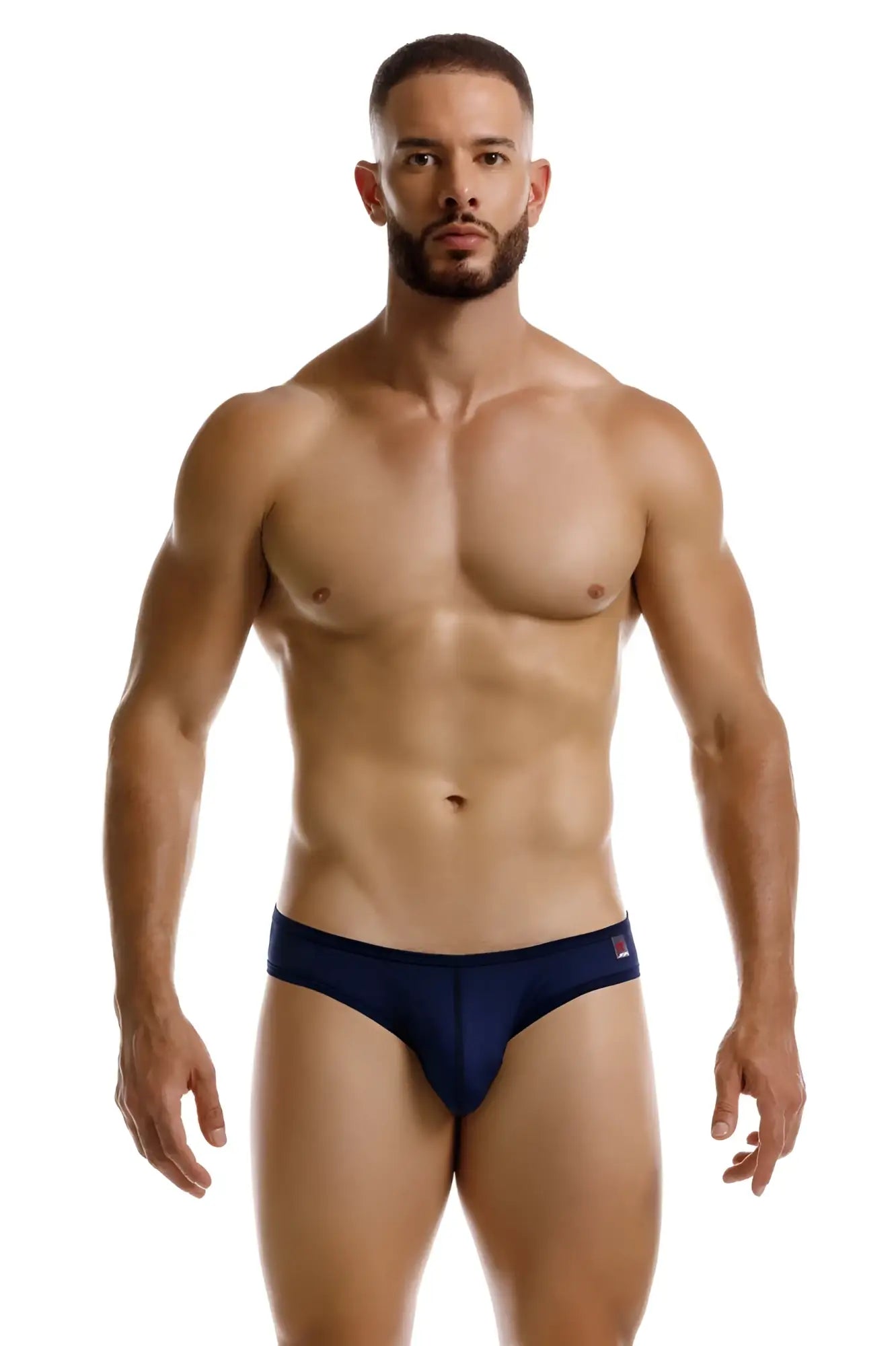 Navy blue JOR 2241 Origin briefs with a small red and white logo on the waistband made of soft fabric