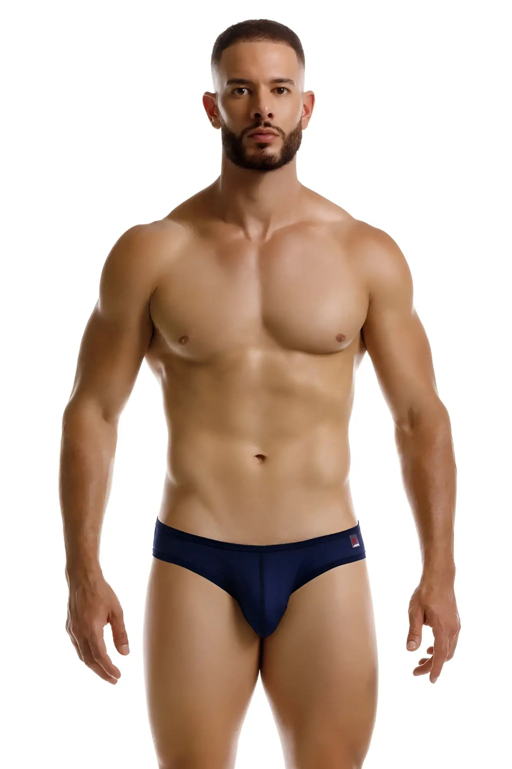Navy blue jor 2242 origin thong briefs with a small red and white logo on the waistband