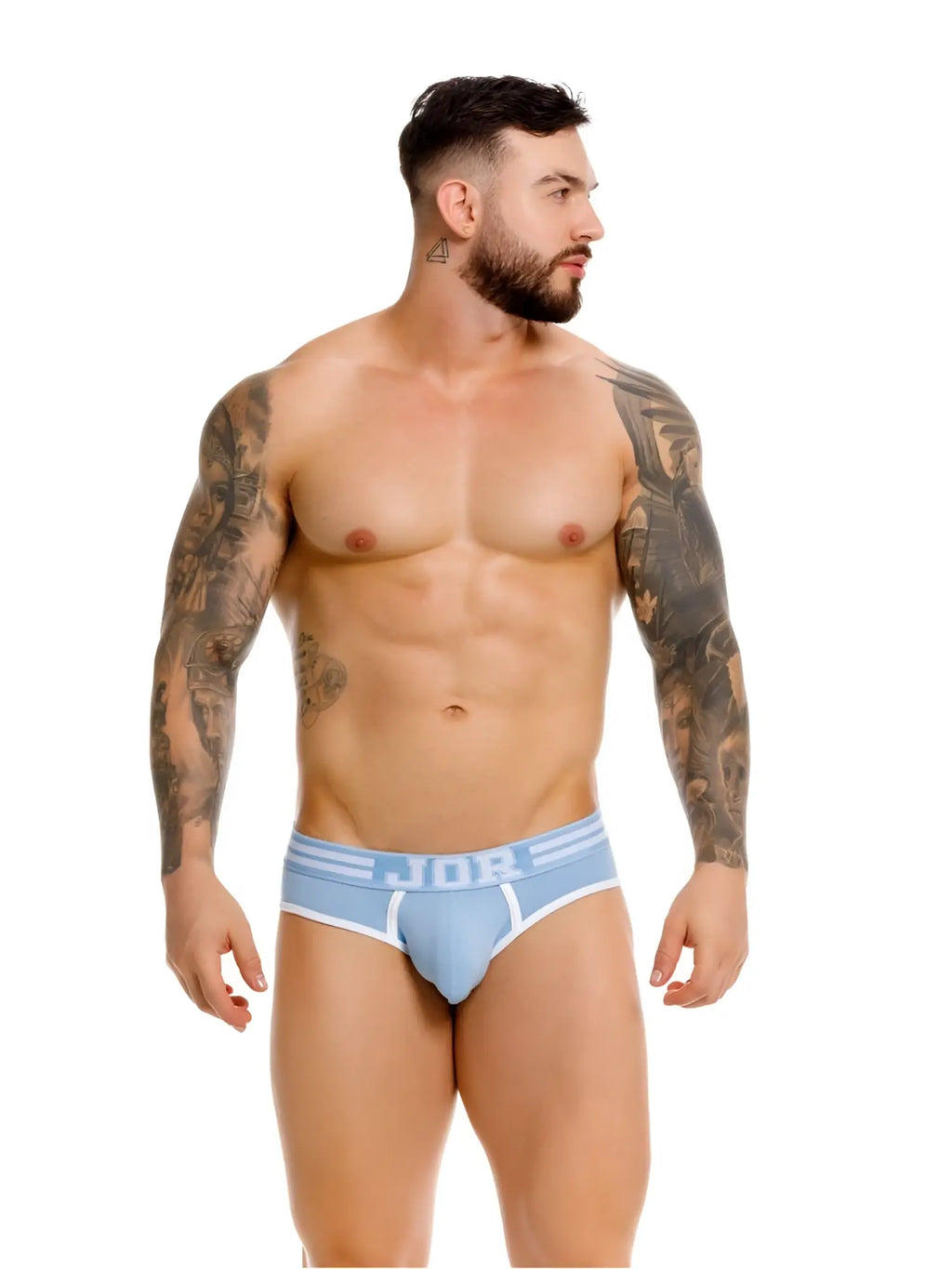 Front view of a model wearing blue JOR 2321 College Briefs against a white background.