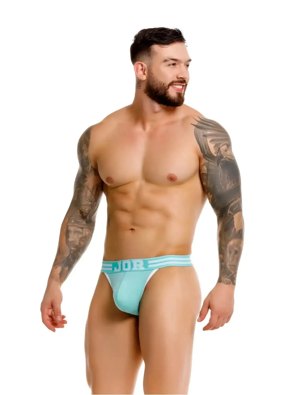 Front view of a model wearing JOR 2323 College Thongs in mint.