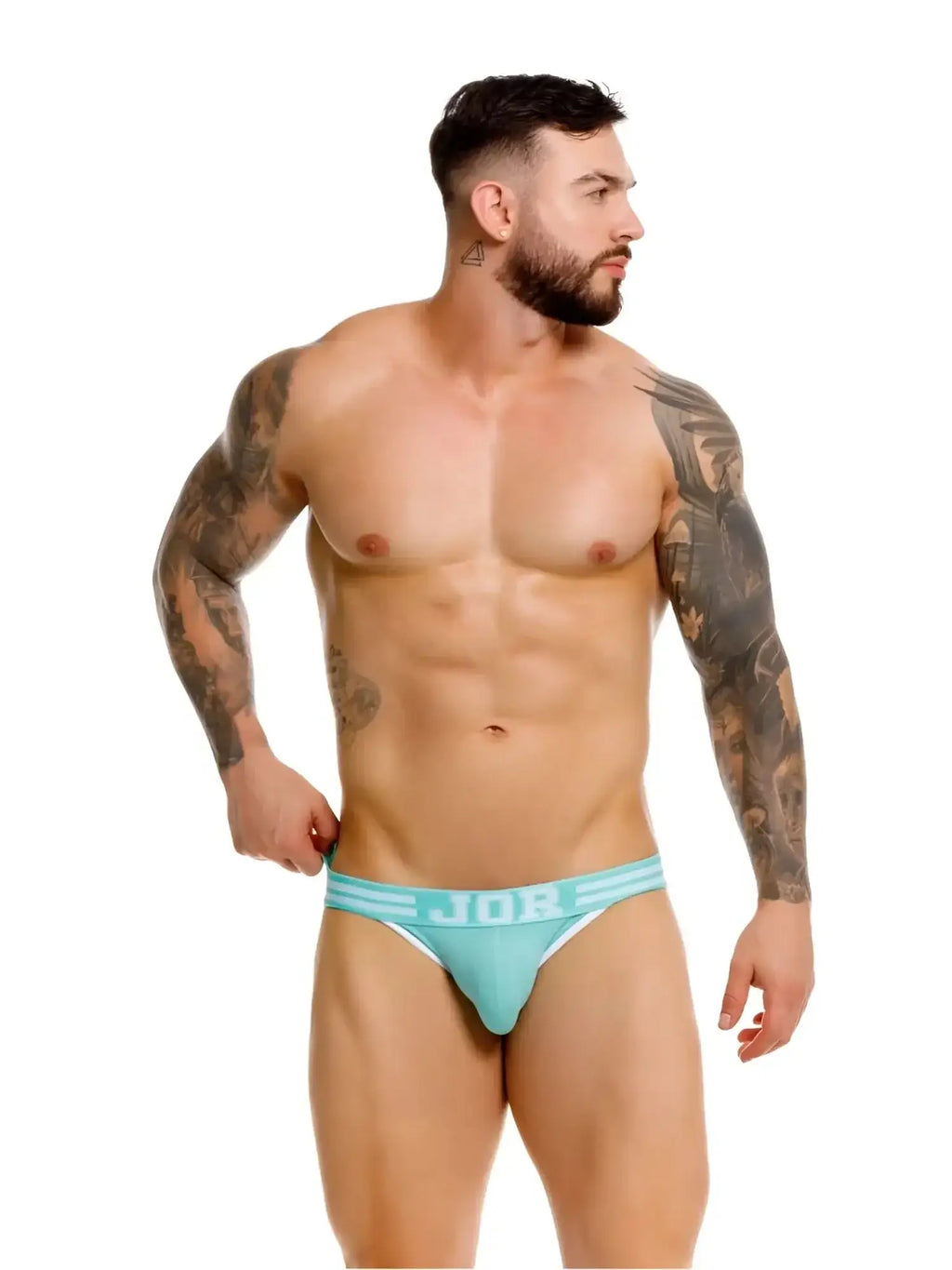 Front view of a model wearing JOR 2323 College thongs in mint color.