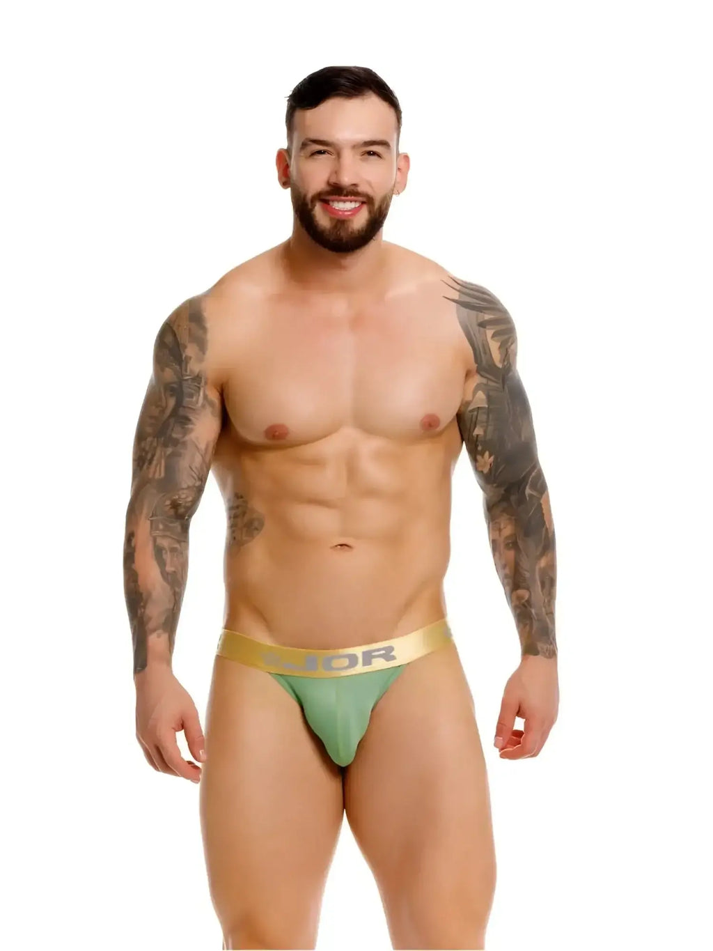 Front view of a man wearing JOR 2328 Soho bikini in green.