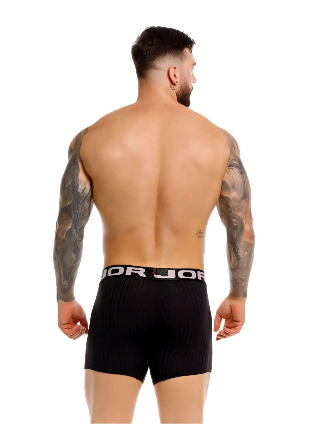Back view of a man wearing JOR 2329 Cronos black ribbed boxer briefs against a white background.