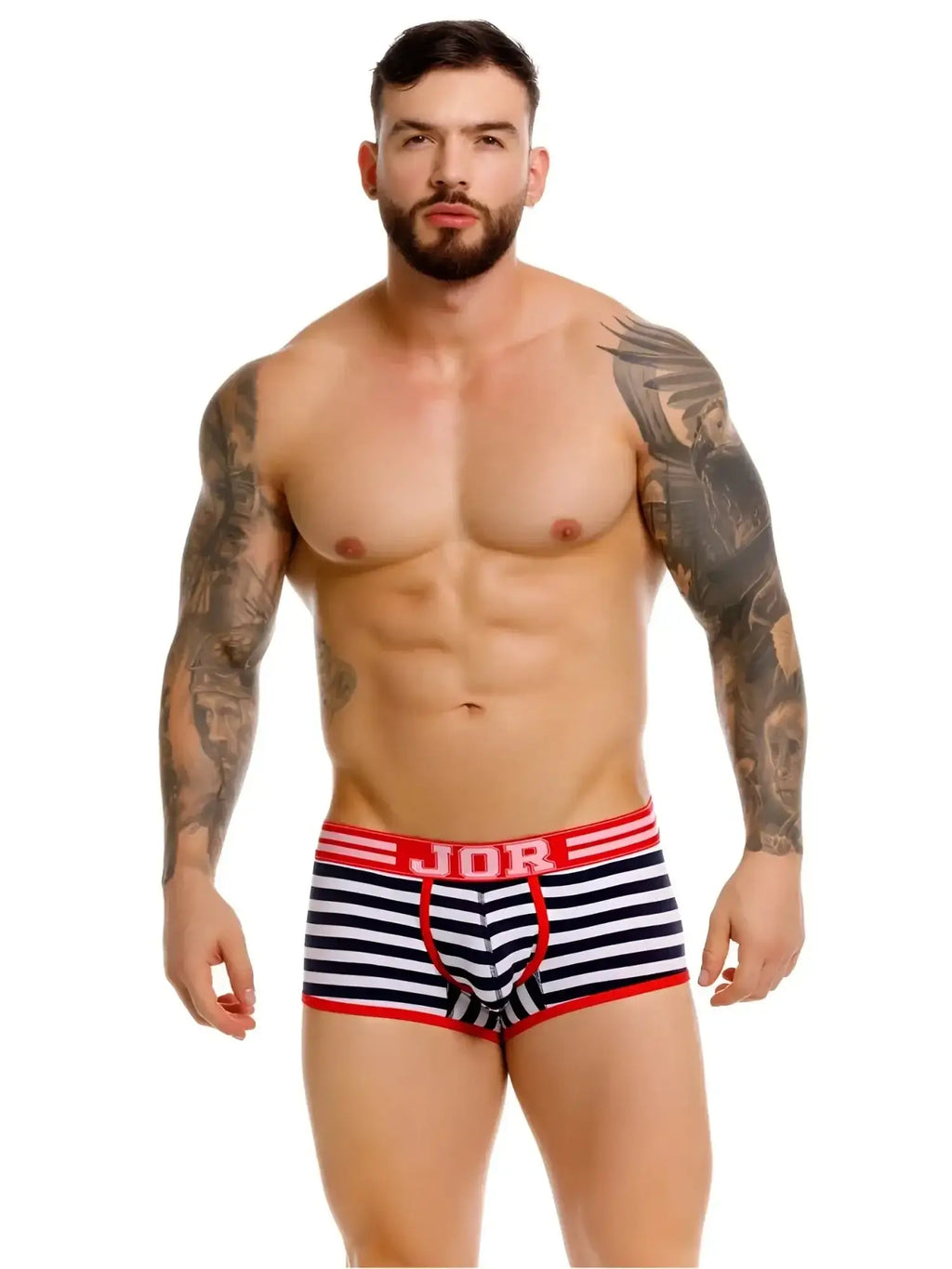 Front view of a model wearing JOR 2334 Santorini striped trunks in navy and white with red trim.